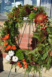 Cotton, roses, protea and berries
